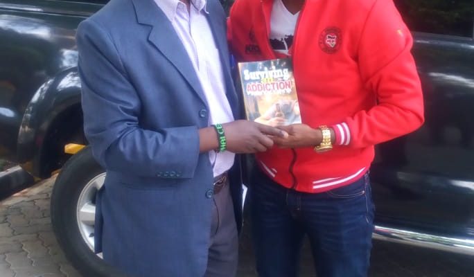 With Nyambane presenting my book Surviving an Addiction